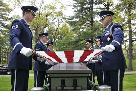 Military funeral with trumpet player