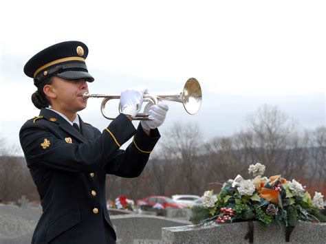 Military funeral songs being played at a National Guard funeral