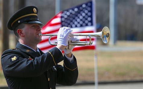 Military funeral with trumpet player