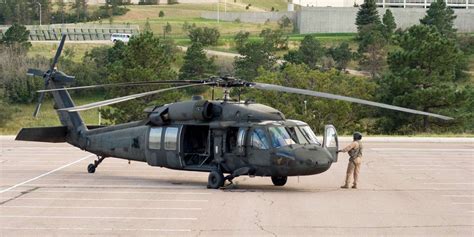 Military helicopter pilots in flight