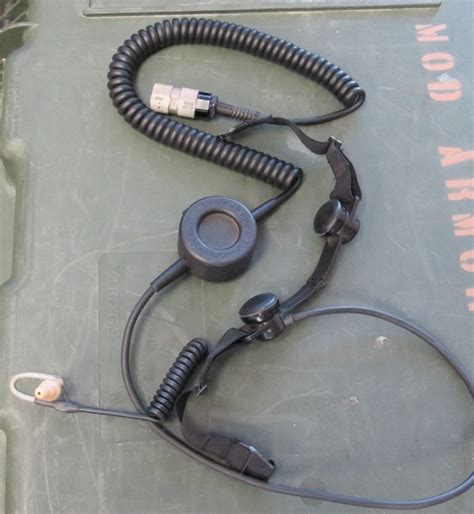 Military personnel using microphones for secure communication