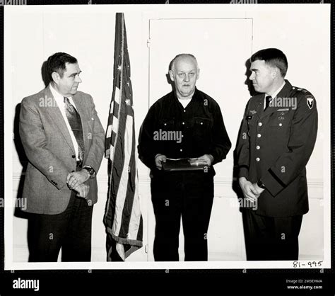 Military personnel receiving award