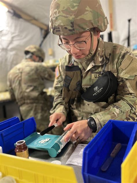 Military pharmacists in a hospital setting