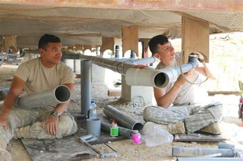 Military plumbers at work