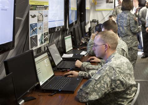 Military personnel using microphones for surveillance and intelligence gathering