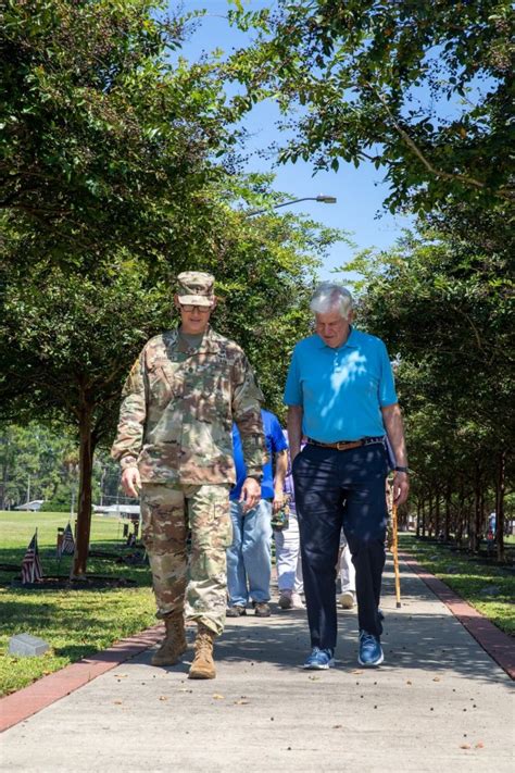 A soldier shaking hands with a civilian employer