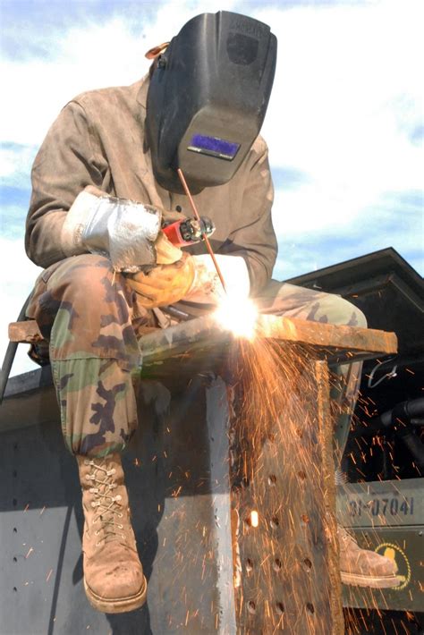 Military welder at work