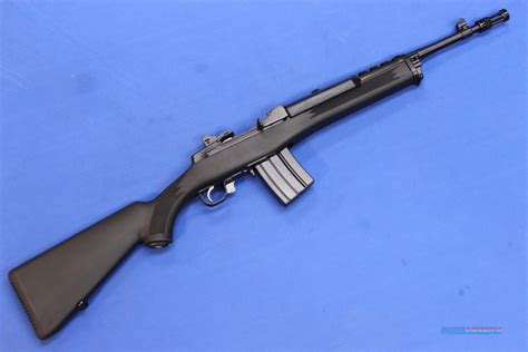 Mini 14 rifle with scope