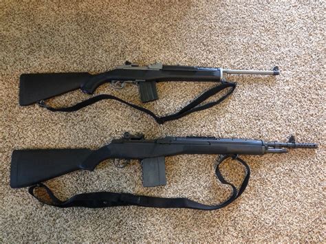 Mini 14 and M14 rifles side by side