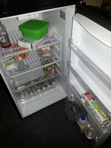 A mini-fridge in a barracks room