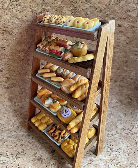 Miniature bakery setup with Barbie dolls