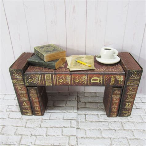 Miniature books on a table