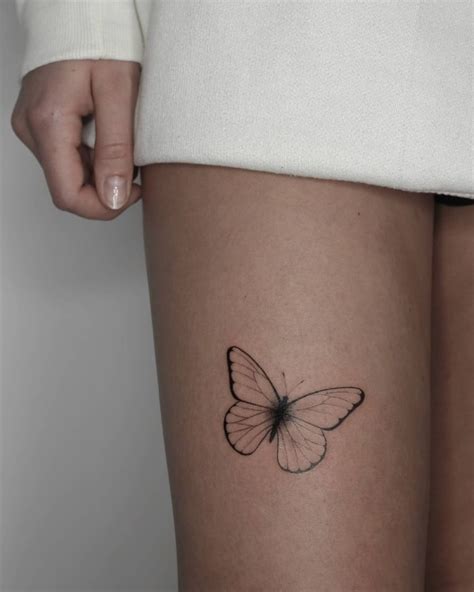 Description of minimalist leg tattoos