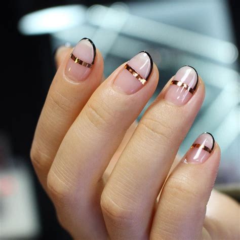 Minimalist nail art design with simple lines and shapes