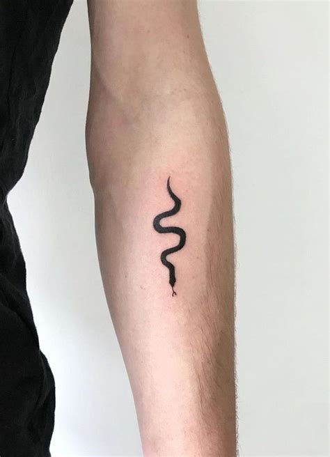 Minimalist snake tattoos for a simple yet elegant look