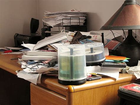 A military officer working in a clutter-free workspace