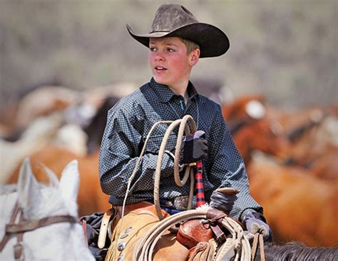 Modern cowboy costume with sleek jacket and cowboy hat