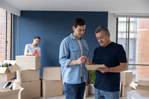 A military moving coordinator helping a family with their PCS move