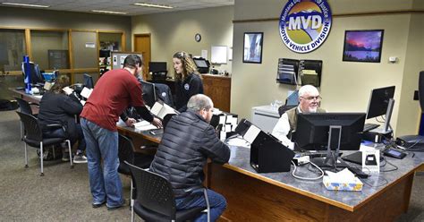 A photo of a person waiting in line at the MVD