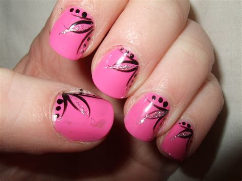 Nail art design with bold colors and patterns