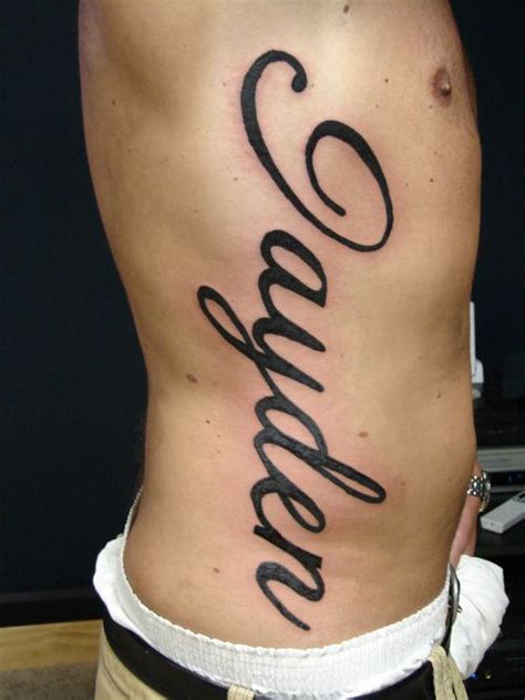 Name tattoos on ribcage