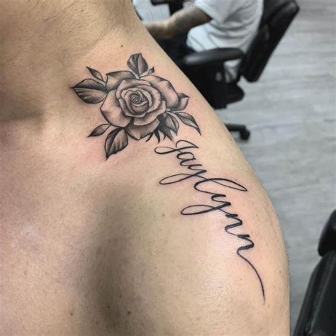 Name tattoos on shoulder