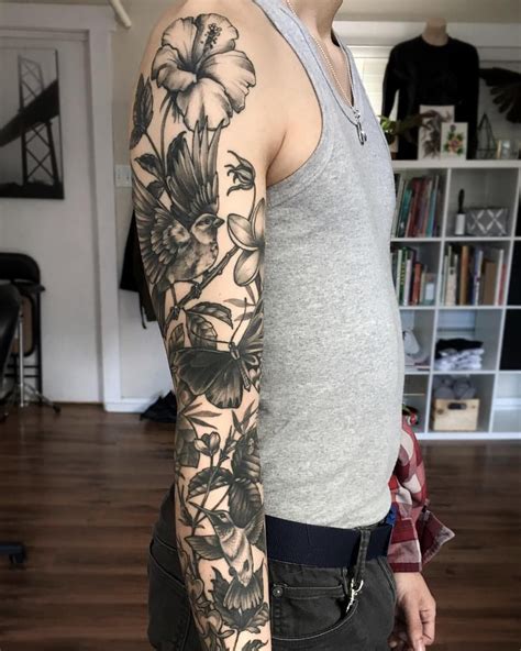 Description of Nature-Inspired Arm Sleeve Tattoo