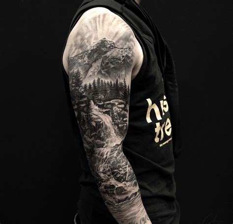 Nature-inspired forearm sleeve tattoo