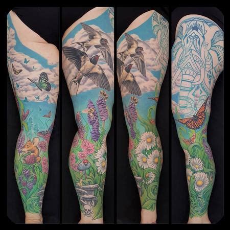 Nature-inspired leg sleeve tattoo