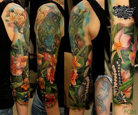 Nature-inspired sleeve tattoos