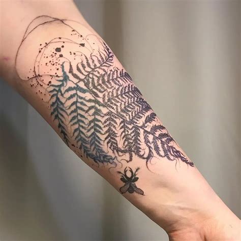 Nature-inspired tattoo on the calf