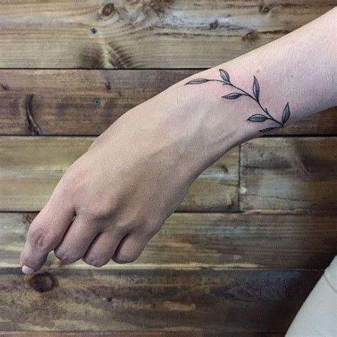 Nature-inspired wrist tattoos designs