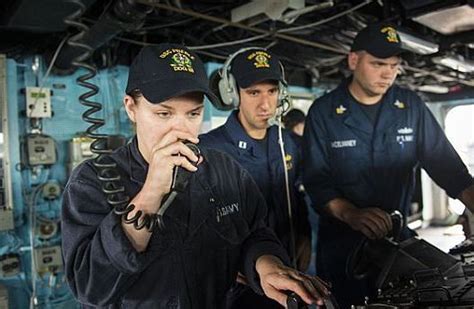 A photo of a naval officer's communication role