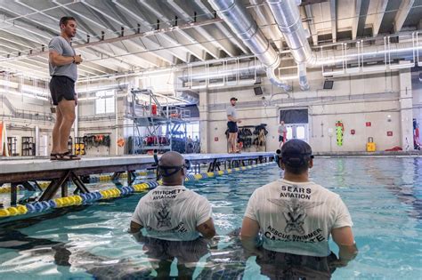 Navy Air Rescue Swimmers performing a rescue