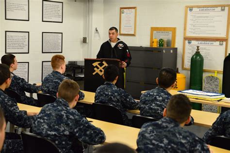 Navy personnel in a classroom