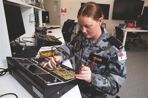 Navy electronics technician at work