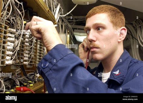 Navy electronics technician at work