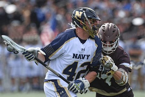 Navy lacrosse team in action