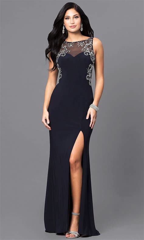 Navy prom dress with silver jewelry and neutral-colored shoes