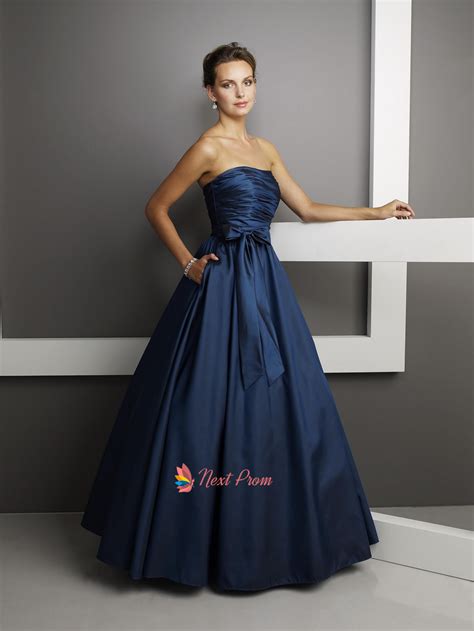 Navy prom dress with a ball gown design