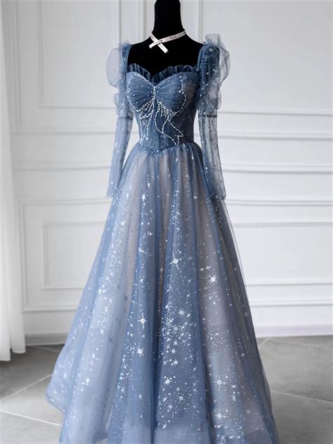 Navy prom dress with a fairytale-like design