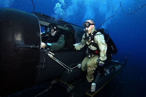 Navy SEALs underwater vehicles