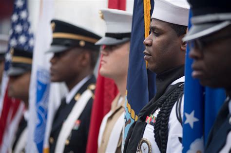 Navy personnel participating in a traditional ceremony