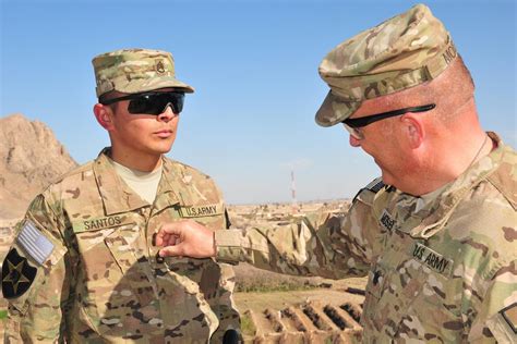 NCO receiving an award