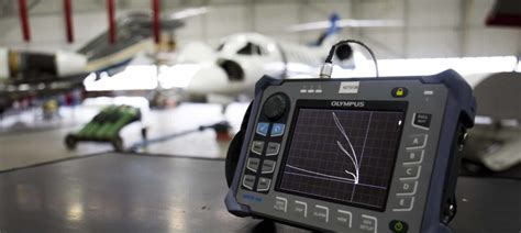 NDT technician inspecting an aerospace component