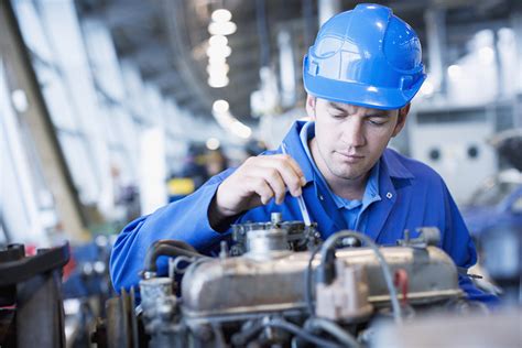 NDT technician inspecting an automotive component