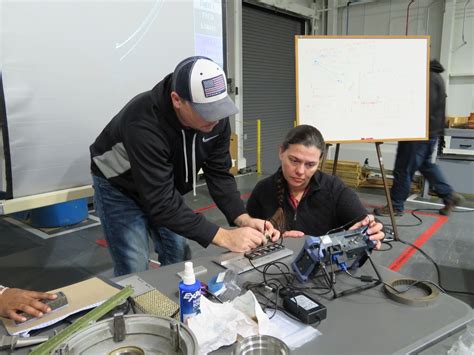 NDT technician using eddy current testing