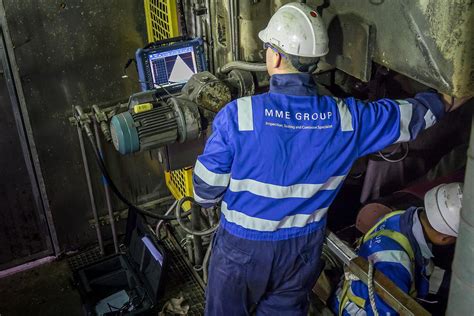 NDT technician using phased array ultrasonic testing