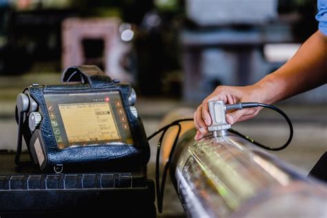 NDT technician inspecting a turbine blade