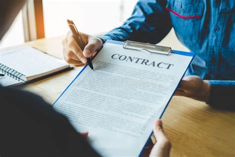 A contract specialist negotiating a contract